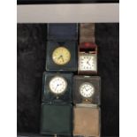 Four travelling alarm clocks in original cases.