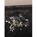 A quantity of modern costume jewellery mainly rings and brooches.