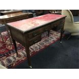 An Edwardian mahogany kneehole desk with red leather inset to top with four drawers to front resting