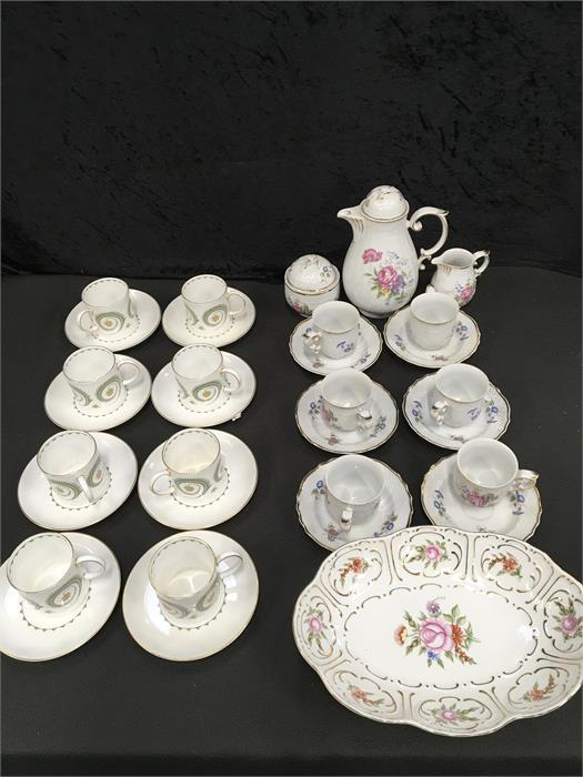 A set of eight Susie Cooper cups and saucers (1 cup cracked) together with a hollohaza teaset.