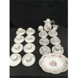 A set of eight Susie Cooper cups and saucers (1 cup cracked) together with a hollohaza teaset.