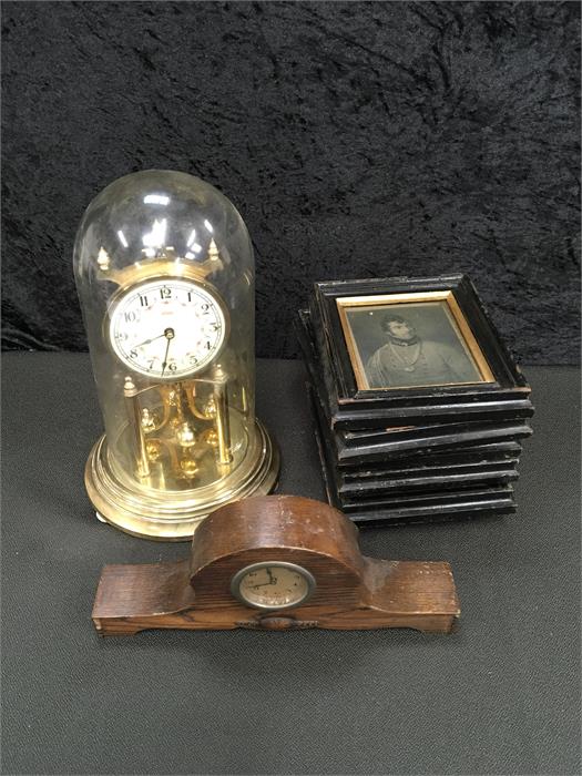 An Anniversary mantle clock together with a small wooden clock and six old prints.