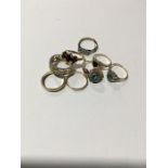 Eight 9ct gold rings containing various stones. Total weight 15.6 grams.