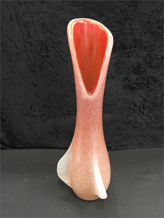 An unusual peach coloured Lily vase (24 inches).