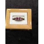 A ruby and diamond ring set in 18ct gold.