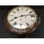 An oak circular office clock with German movement.