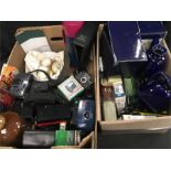 Two boxes of mixed collectables to include cameras, diecast cars, Bourne Denny jugs etc.