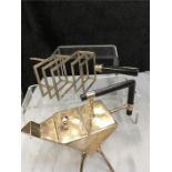 A toast rack and teapot in the style of Christopher Dresser.
