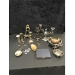A box of silver plated items together with a pair of white metal vases, a silver napkin ring, silver
