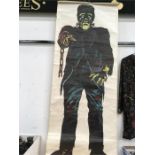 A large poster of Frankenstein 70" x 27".