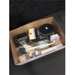 A box of collectables to include first aid travel kit, number plate holder, pen knives.