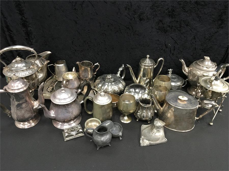 A large quantity of silver plate.