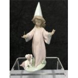 A Lladro figure: " Under My Spell".