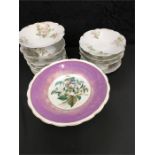 A dessert service by D. & Co , Limoges consisting of 6 comports and 10 plates together with a