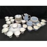 A retro Wedgwood china tea set with a Bell china tea set.