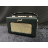 A vintage Roberts Radio in green leather.