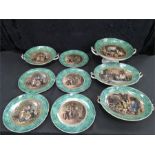 A collection of green glazed Prattware pottery dessert set in the 1851 pattern and painted by E