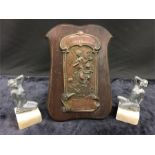 A 1920's Art Nouveau plaque with two lady statues on marble bases.