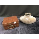 A 1930's part picnic set in leather case and a squat glass vase.