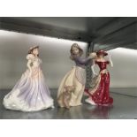 A NAO figure of a lady together with two Royal Worcester ladies.