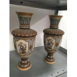 A pair of Mettlach china vases, approximately 14.5" high.
