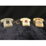 Three vintage/retro landline telephones.