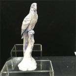 A North Light 10" figure of a Macaw.