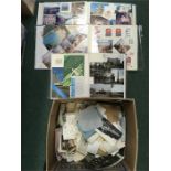 A box of ephemera to include postcards.