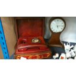 A wooden mantle clock together with a retro telephone in wooden box.