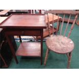 A two tier occasional table with single drawer to front with a elm seated stick back chair.