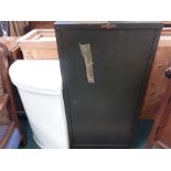 A Valour metal document cupboard with a linen basket.