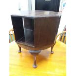 A mahogany revolving drum table.