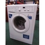 An Indesit 7kg washing machine.