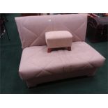 A pull out sofa bed with full metal action together with a stool.