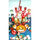 A collection of Russian dolls together with other items.