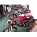 Three various children's bikes.