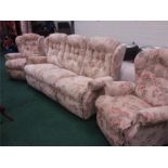 A three piece cottage suite comprising a three seater sofa and two armchairs.