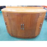 An Art Deco half round sideboard.