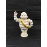 A waving Michelin man. (R186)