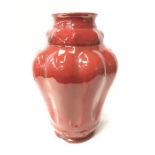 Carter & Co Poole Pottery large red lustre vase with formed gadrooned panels incised Carter & Co