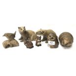 Poole Pottery Barbara Linley Adams group of animals to include a pair of badgers, hedgehog plus