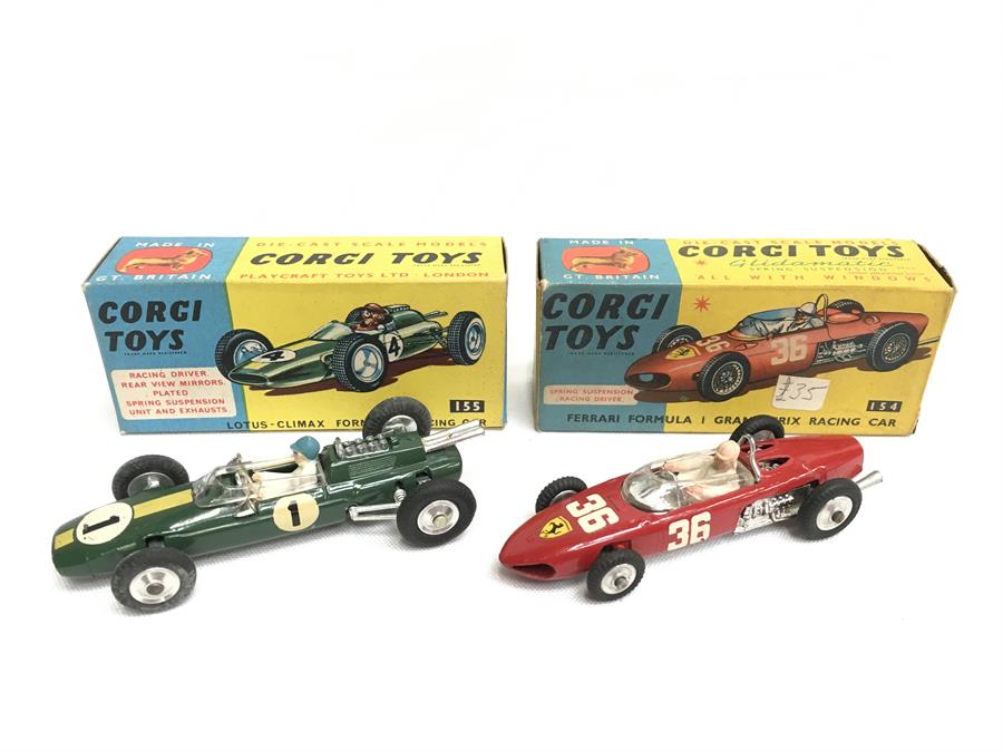 Two Corgi Toys Formula 1 racing cars: 154 Ferrari (G/VG in G/VG box with price sticker); 155 Lotus-
