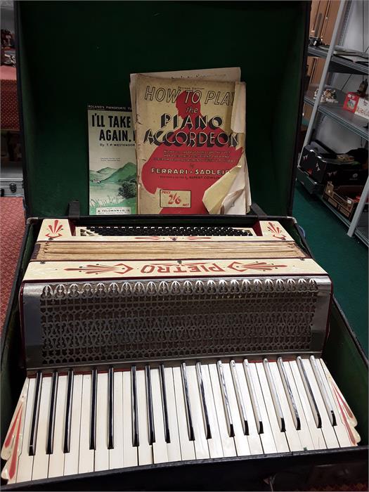 A Vintage large piano accordion in case.