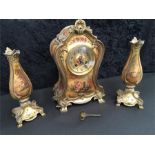 A 19th century French clock garniture with painted pastoral scenes and ormolu mounts. (Including