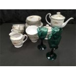 Three green glass goblets together with a Japanese tea set including teapot.