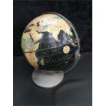 A Weber and Costello globe on chrome base and stand (approx. 14" high).