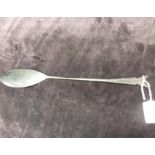 A Chinese metal long handled opium spoon. (30cms).