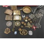 A box of Military badges, buttons and other associated items.