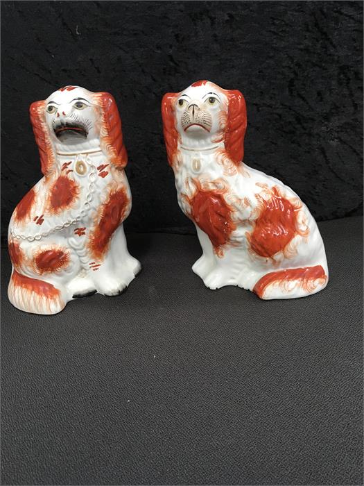 Two Staffordshire dogs 9" high.