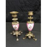 A pair of French pink porcelain candlesticks with Ormolu mounts. (6.5" high).